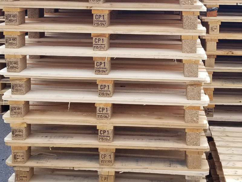 stacks of CP1 chemical pallets