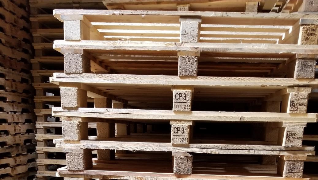 stacks of CP3 chemical pallets