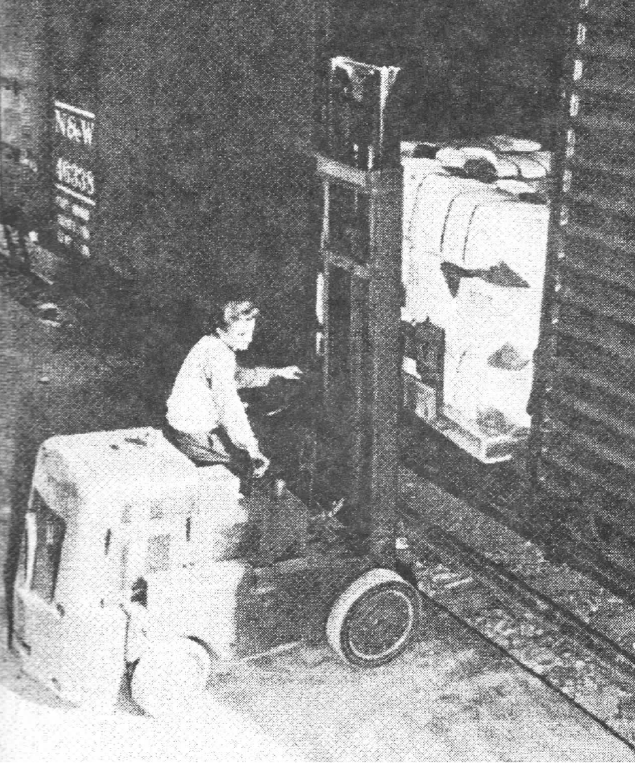 loading baled uniforms during WWII